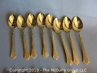 43 pieces of gold toned flatware 