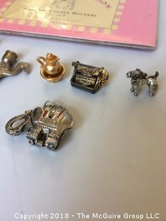 Collection of Cake Candle Holders, Mini Metal Objects, Elephant that Opens, and Proof Coin