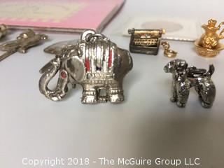 Collection of Cake Candle Holders, Mini Metal Objects, Elephant that Opens, and Proof Coin