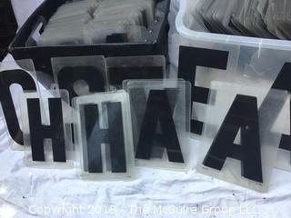 Two Bins of Plastic Movie Theatre Marquee Letters and Numbers