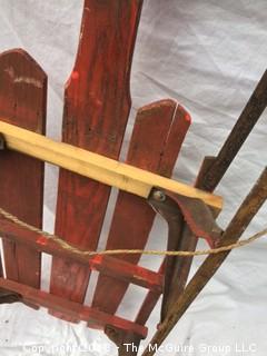 Old Red Wooden Sled with Metal Runners