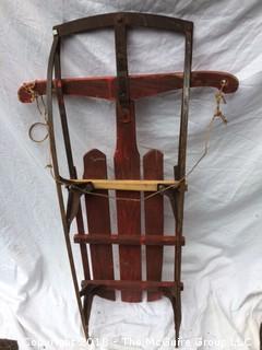 Old Red Wooden Sled with Metal Runners