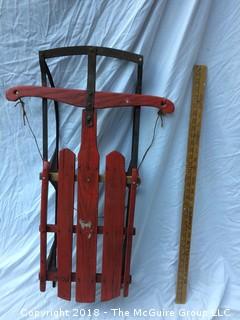 Old Red Wooden Sled with Metal Runners