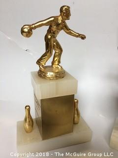 Collection of Old Boxes and Bowling Trophies