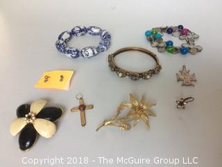 Collection of Costume Jewelry Including Signed Pins and Bracelets