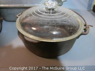 Vintage pots and pans including cast iron with glass cover 