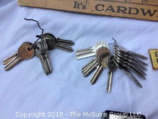 Collection of Keys, Blank Keys, Car Emblems, Amp Meter, and Apartment Ringer Box