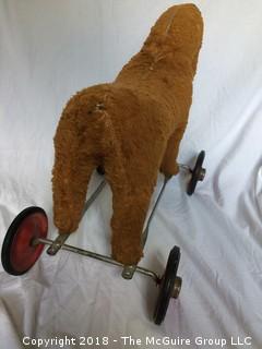 Vintage Stuffed Toy Horse on Metal Wheels