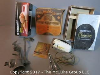 Collection of kitchenware appliances including Hamilton Beach "Mixette" with original box and instruction book, meat grinder, marble cake pan set in original box and electric carving knife