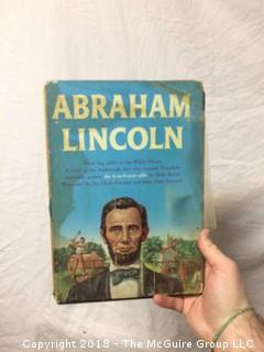 Collection of Children's Books: Abraham Lincoln, Wizard of Oz, Charlie Brown