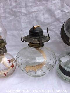 Collection of Vintage Oil Lamps and Shades