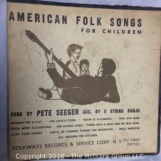 Two Folkways Records, One of Pete Seeger and One Woody Guthrie, and 45 of Michael Jackson/Lionel Ritchie We are the World