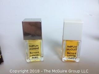 Collection of Mini Perfume Bottles with Perfume Including Avon Charisma Mouse, Balmain, and Guerlain