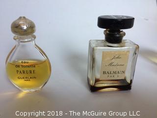 Collection of Mini Perfume Bottles with Perfume Including Avon Charisma Mouse, Balmain, and Guerlain