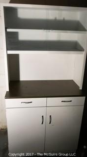 2 metal storage cabinets