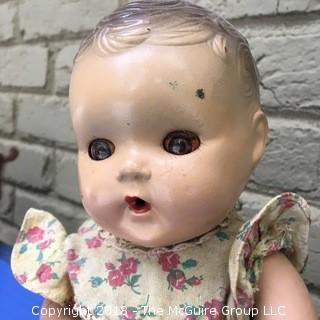 Sun Rubber Baby Doll with Skin Issues and Red Eyes