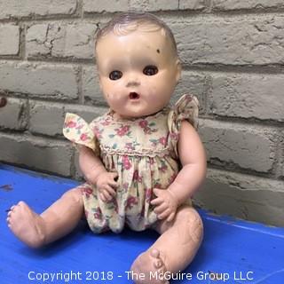 Sun Rubber Baby Doll with Skin Issues and Red Eyes