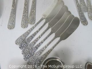 84 Piece Steiff Repoussee Sterling Flatware Cutlery Set; total weight (excluding knives); 2900g (8 teaspoons, 6 oversized dinner service spoons, 3 elongated dinner service spoons, 6 butter knives, 4 serving spoons, 7 large soup spoons, 6 small soup spoons, 5 tablespoons, 1 ladle, 4 cocktail spoons, 8 dinner knives, 8 dinner forks, 8 dinner spoons, 8 meat forks, 4 pickle forks)