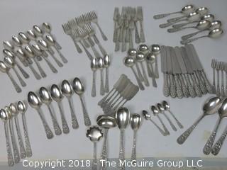 84 Piece Steiff Repoussee Sterling Flatware Cutlery Set; total weight (excluding knives); 2900g (8 teaspoons, 6 oversized dinner service spoons, 3 elongated dinner service spoons, 6 butter knives, 4 serving spoons, 7 large soup spoons, 6 small soup spoons, 5 tablespoons, 1 ladle, 4 cocktail spoons, 8 dinner knives, 8 dinner forks, 8 dinner spoons, 8 meat forks, 4 pickle forks)