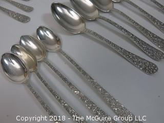 84 Piece Steiff Repoussee Sterling Flatware Cutlery Set; total weight (excluding knives); 2900g (8 teaspoons, 6 oversized dinner service spoons, 3 elongated dinner service spoons, 6 butter knives, 4 serving spoons, 7 large soup spoons, 6 small soup spoons, 5 tablespoons, 1 ladle, 4 cocktail spoons, 8 dinner knives, 8 dinner forks, 8 dinner spoons, 8 meat forks, 4 pickle forks)