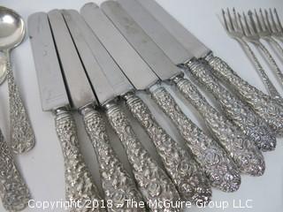 84 Piece Steiff Repoussee Sterling Flatware Cutlery Set; total weight (excluding knives); 2900g (8 teaspoons, 6 oversized dinner service spoons, 3 elongated dinner service spoons, 6 butter knives, 4 serving spoons, 7 large soup spoons, 6 small soup spoons, 5 tablespoons, 1 ladle, 4 cocktail spoons, 8 dinner knives, 8 dinner forks, 8 dinner spoons, 8 meat forks, 4 pickle forks)