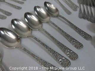 84 Piece Steiff Repoussee Sterling Flatware Cutlery Set; total weight (excluding knives); 2900g (8 teaspoons, 6 oversized dinner service spoons, 3 elongated dinner service spoons, 6 butter knives, 4 serving spoons, 7 large soup spoons, 6 small soup spoons, 5 tablespoons, 1 ladle, 4 cocktail spoons, 8 dinner knives, 8 dinner forks, 8 dinner spoons, 8 meat forks, 4 pickle forks)