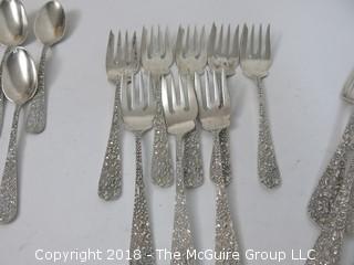 84 Piece Steiff Repoussee Sterling Flatware Cutlery Set; total weight (excluding knives); 2900g (8 teaspoons, 6 oversized dinner service spoons, 3 elongated dinner service spoons, 6 butter knives, 4 serving spoons, 7 large soup spoons, 6 small soup spoons, 5 tablespoons, 1 ladle, 4 cocktail spoons, 8 dinner knives, 8 dinner forks, 8 dinner spoons, 8 meat forks, 4 pickle forks)