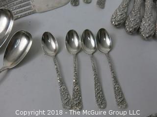 84 Piece Steiff Repoussee Sterling Flatware Cutlery Set; total weight (excluding knives); 2900g (8 teaspoons, 6 oversized dinner service spoons, 3 elongated dinner service spoons, 6 butter knives, 4 serving spoons, 7 large soup spoons, 6 small soup spoons, 5 tablespoons, 1 ladle, 4 cocktail spoons, 8 dinner knives, 8 dinner forks, 8 dinner spoons, 8 meat forks, 4 pickle forks)