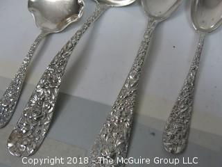 84 Piece Steiff Repoussee Sterling Flatware Cutlery Set; total weight (excluding knives); 2900g (8 teaspoons, 6 oversized dinner service spoons, 3 elongated dinner service spoons, 6 butter knives, 4 serving spoons, 7 large soup spoons, 6 small soup spoons, 5 tablespoons, 1 ladle, 4 cocktail spoons, 8 dinner knives, 8 dinner forks, 8 dinner spoons, 8 meat forks, 4 pickle forks)