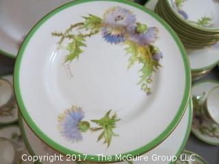 94 piece Royal Doulton "Glamis Thistle" pattern china; includes 12 dinner plates, 12 salad plates, 12 small plates, 16 side plates, 11 bowls, 2 platters, 3 demi tasse cups/saucers, 14 cups/saucers, tea pot, cream and sugar, 9 additional pieces  