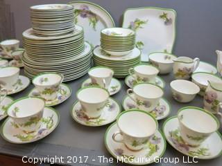 94 piece Royal Doulton "Glamis Thistle" pattern china; includes 12 dinner plates, 12 salad plates, 12 small plates, 16 side plates, 11 bowls, 2 platters, 3 demi tasse cups/saucers, 14 cups/saucers, tea pot, cream and sugar, 9 additional pieces  