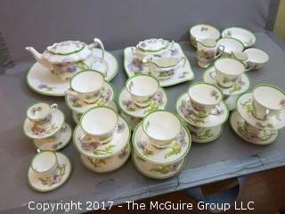 94 piece Royal Doulton "Glamis Thistle" pattern china; includes 12 dinner plates, 12 salad plates, 12 small plates, 16 side plates, 11 bowls, 2 platters, 3 demi tasse cups/saucers, 14 cups/saucers, tea pot, cream and sugar, 9 additional pieces  