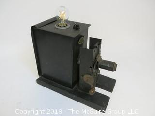 One of a Kind "Up-Cycled" Early Projector Turned Into Light (Edison style bulb not included)