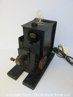 One of a Kind "Up-Cycled" Early Projector Turned Into Light (Edison style bulb not included)