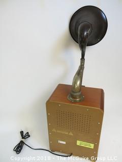 Working AM/FM "Antique style" radio with big horn bolted to the top; original speaker in the front grill, and a new "up-firing" midrange speaker mounted below the horn