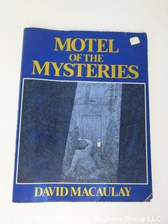 Book Title: "Motel of the Mysteries" by David MacAuley; 1979