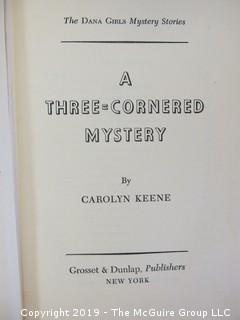 Book Title: "A Three-Cornered Mystery" by Carolyn Keene; 1935; pub by Grosset and Dunlap; 