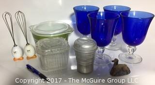 Collection of kitchenware including Pyrex, pair of egg beaters, set of (4) cobalt blue stems and a masher, complete with stand and pestle