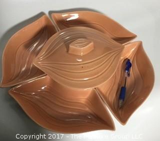 Mid-Century salmon colored chip and dip covered bowl surrounded by 4 matching bowls 