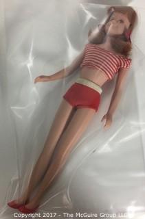 Vintage Skipper and Scooter dolls, clothes and case