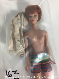 Vintage Skipper and Scooter dolls, clothes and case