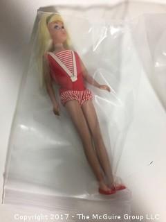 Vintage Skipper and Scooter dolls, clothes and case