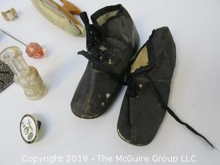 Collection including leather baby shoes