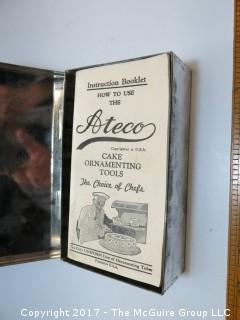 Vintage cake decorating kit, complete, in original tin box 