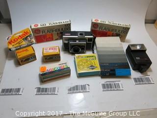 Collection of vintage camera film and flashbulbs 