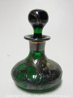 Hand blown green glass carafe with stopper and silver overlay; 4" tall