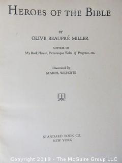 Collection of books including "Heroes of the Bible" by Olive Beaupre Miller