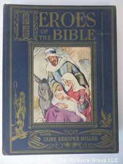 Collection of books including "Heroes of the Bible" by Olive Beaupre Miller