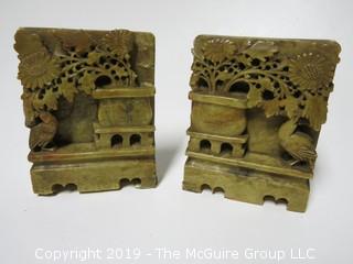 Asian motif carved jade bookends; 5" tall (Note: damage to one)