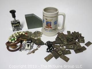 Collection including wooden dominoes, costume jewelry, beer stein, office stamper and granite bookend 